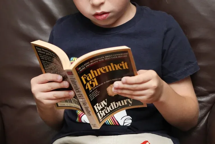 Fahrenheit 451 by Ray Bradbury - Earbuds, Wall Screens, and Distraction Culture (Image Credits: Flickr)