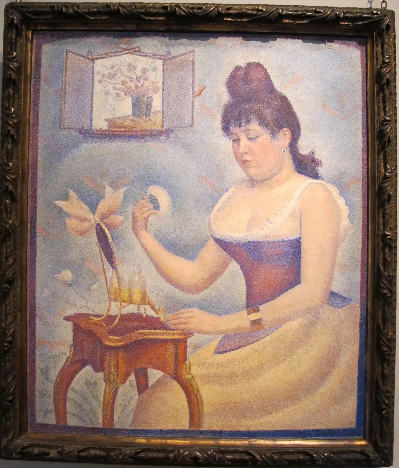 7. Young Woman Powdering Herself by Georges Seurat (1889–1890) - The Artist Who Painted Himself Out (By Sailko, CC BY-SA 3.0)