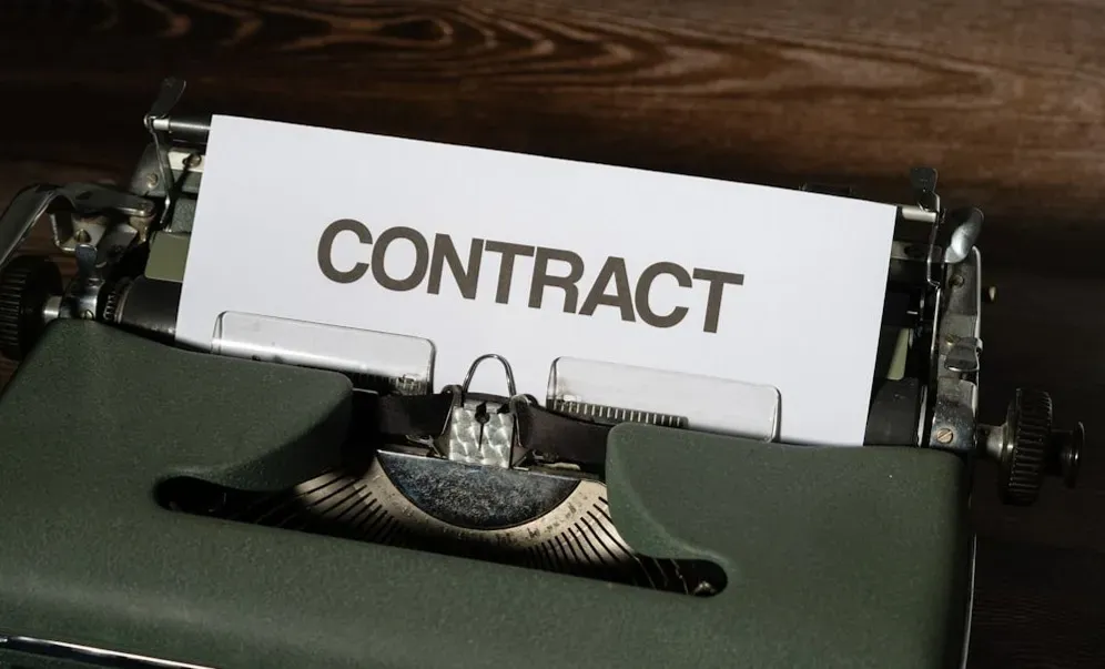 The Contractual and Commercial Reality (Image Credits: Unsplash)