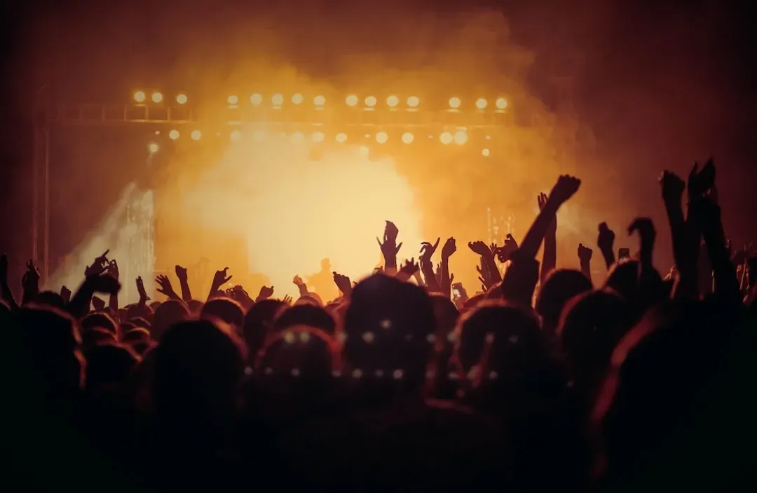 3. Watching Every Eye Turn to the Stage Without a Phone in Sight (Image Credits: Unsplash)