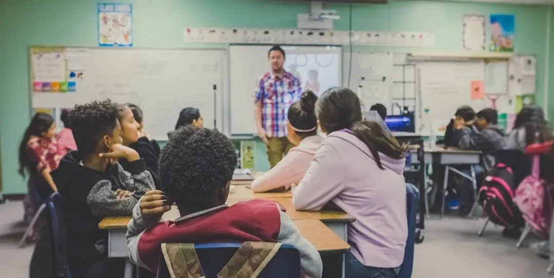 A teacher fired for refusing to drop it (Image Credits: Unsplash)