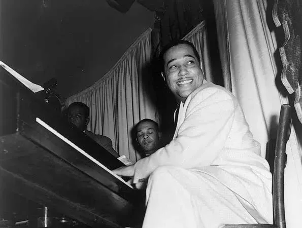 Billy Strayhorn and Duke Ellington's orchestra (Image Credits: Wikimedia)