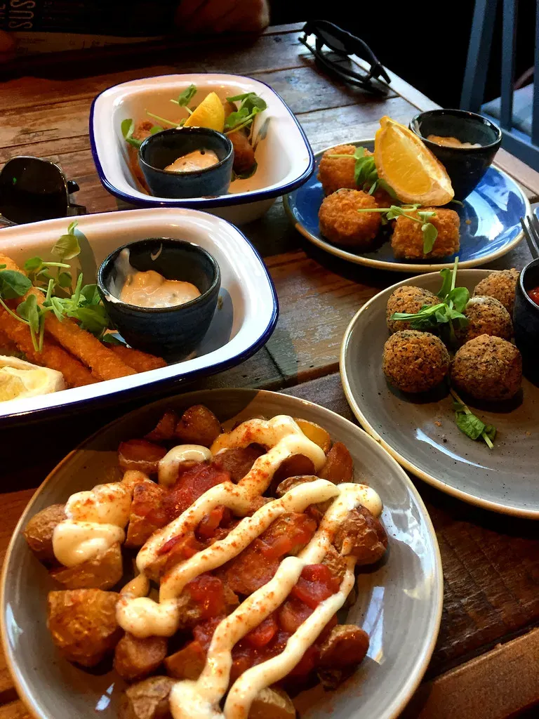 Firefly Tapas: Small Plates, Big Late-Night Savings (Image Credits: Flickr)