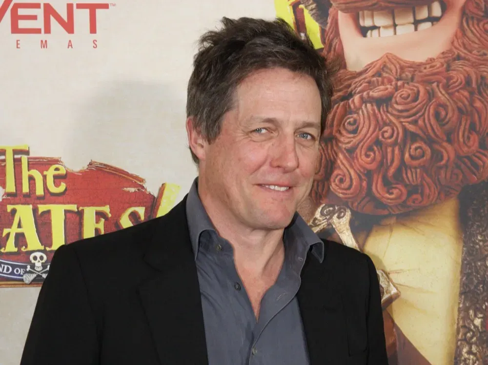 Hugh Grant's reluctant Oscars red carpet moment (Image Credits: Wikimedia)