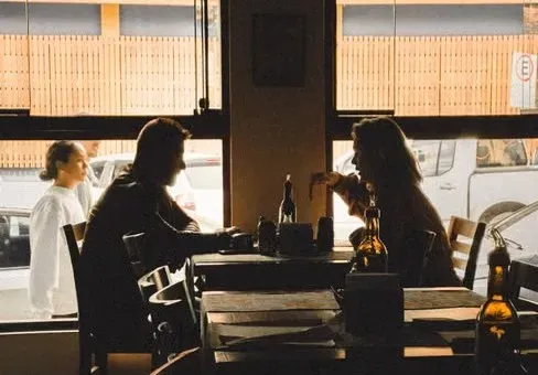 Line 10: A Couple in a Diner (Image Credits: Pexels)