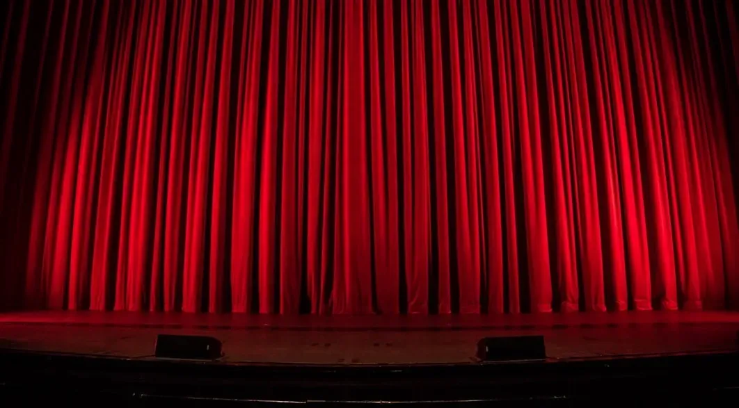 Motorized curtains and the dreaded shout of "Booth!" (Image Credits: Unsplash)