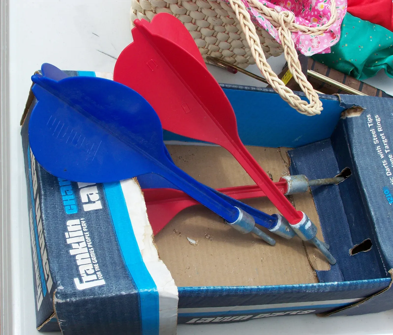 1. Lawn Darts (Jarts) - The Backyard Weapon Disguised as a Game (Day 361 - lawn darts at an elementary school rummage sale!! (I didn't buy 'em), CC BY 2.0)