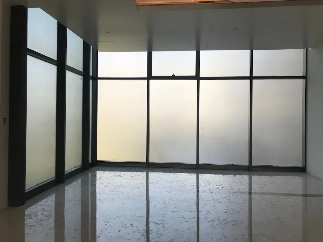 2. Reflective and Smart Window Film: Block the View From Inside Out (Image Credits: Unsplash)