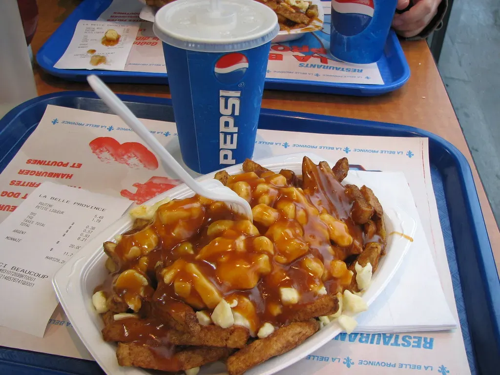 Poutine at Winter Carnivals, Canada (Image Credits: Flickr)