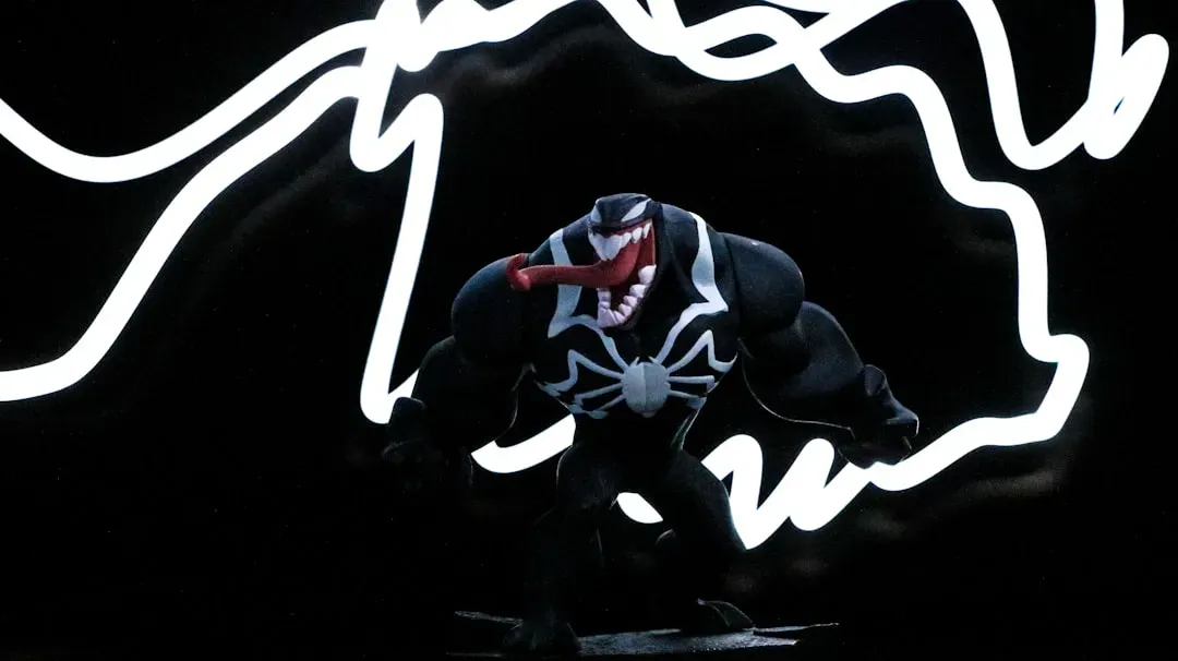 2. Venom's Spider-Man 3 concept art leaned toward purple hues and an Alien-style face (Image Credits: Unsplash)