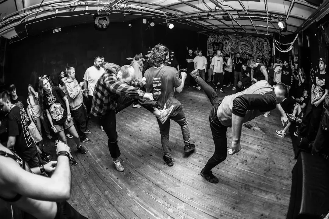 8. Fighting or Physically Intimidating Other Attendees (Image Credits: Unsplash)