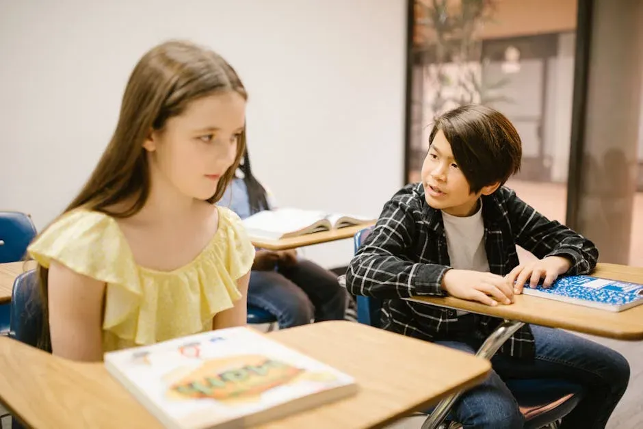 7. Talking Out of Turn or Having Side Conversations (Image Credits: Pexels)