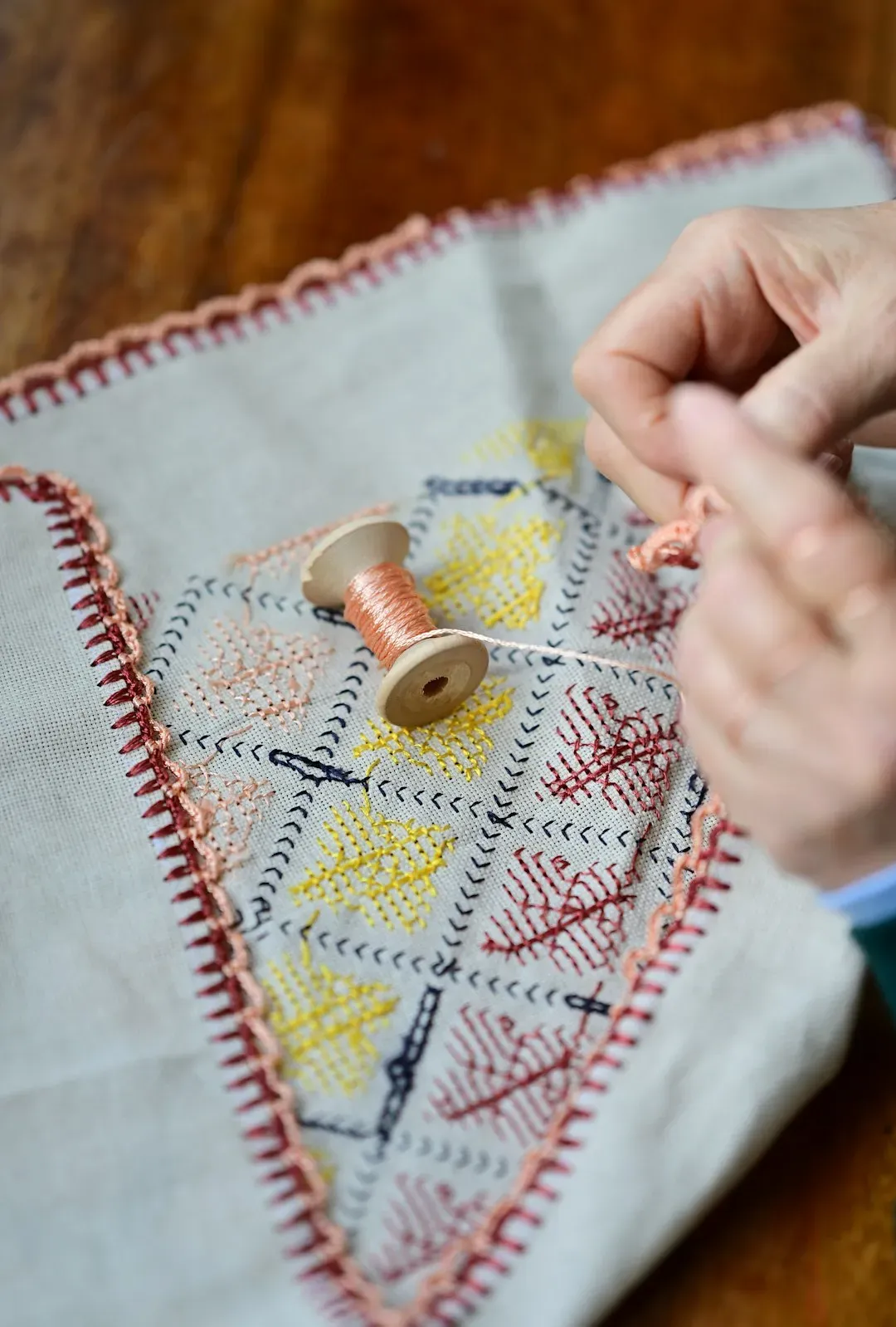 Hand-Embroidered Kitchen Linens (Image Credits: Unsplash)