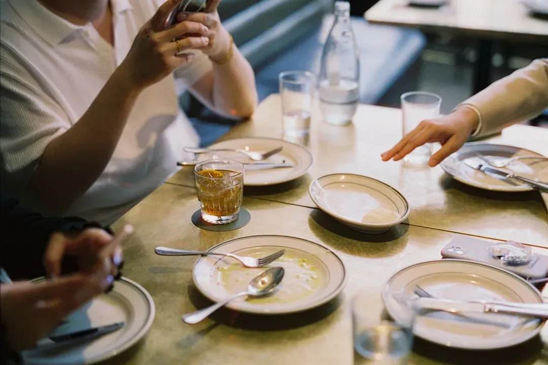 Your Phone Etiquette at the Table (Image Credits: Unsplash)