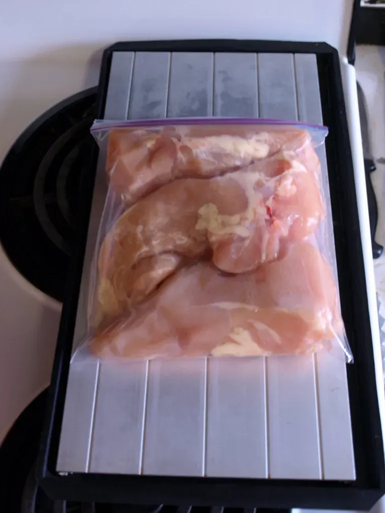 8. Thawing Meat on the Countertop (Image Credits: Flickr)