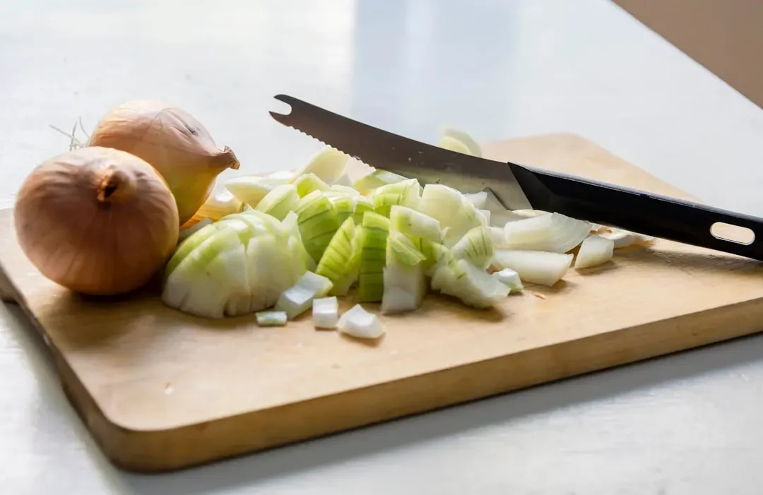 3. Never Drag the Blade Sideways Across the Cutting Board (Image Credits: Unsplash)