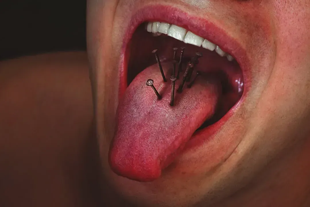 7. Inflamed Tongue and Mouth Sores (Image Credits: Unsplash)