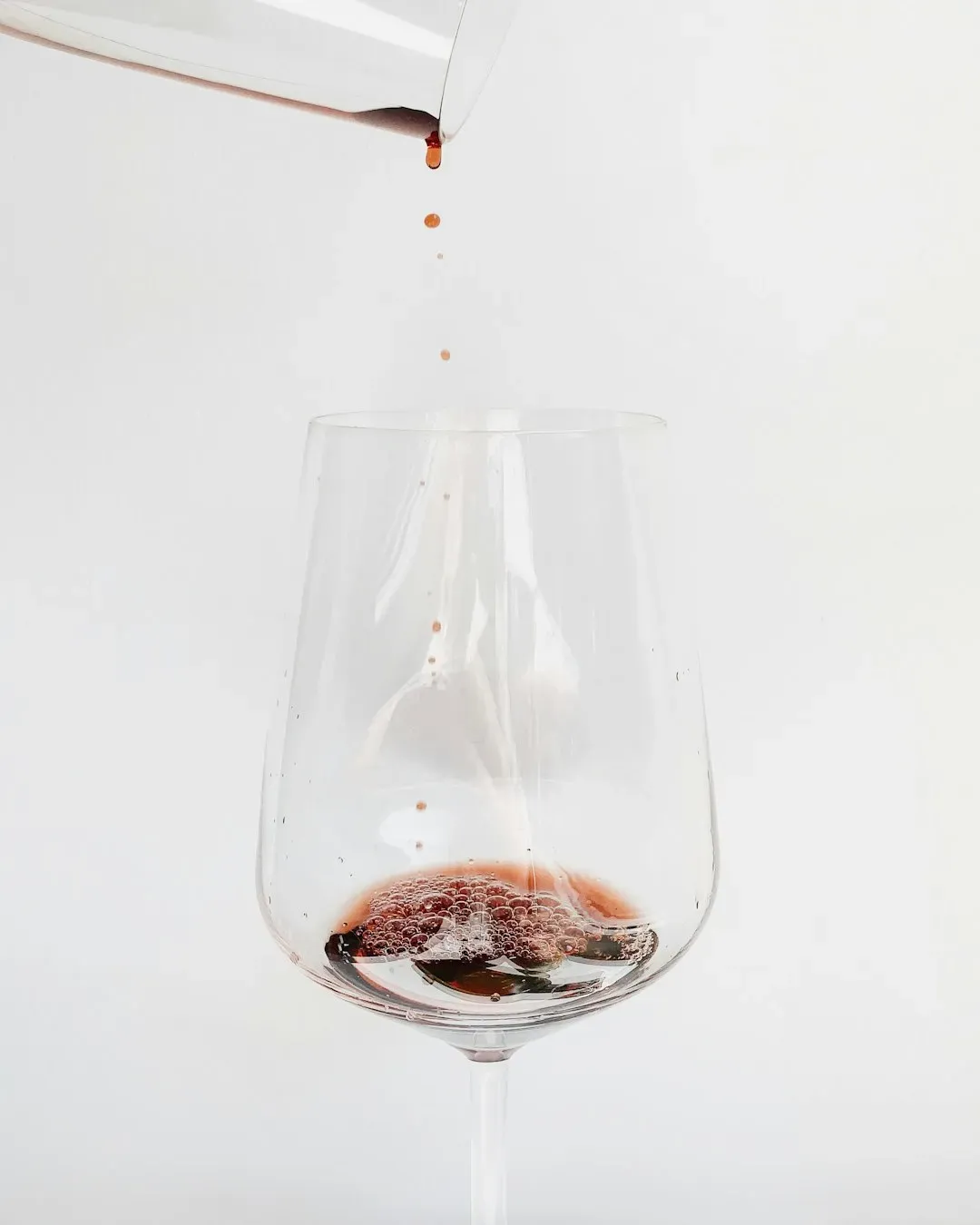 Check the Sediment, the Fill Level, and the Glass Itself (Image Credits: Unsplash)