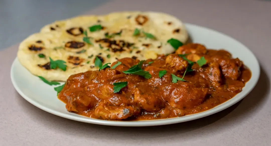 5. Chicken Tikka Masala, Britain's "National Dish," Was Invented in Scotland (Image Credits: Unsplash)