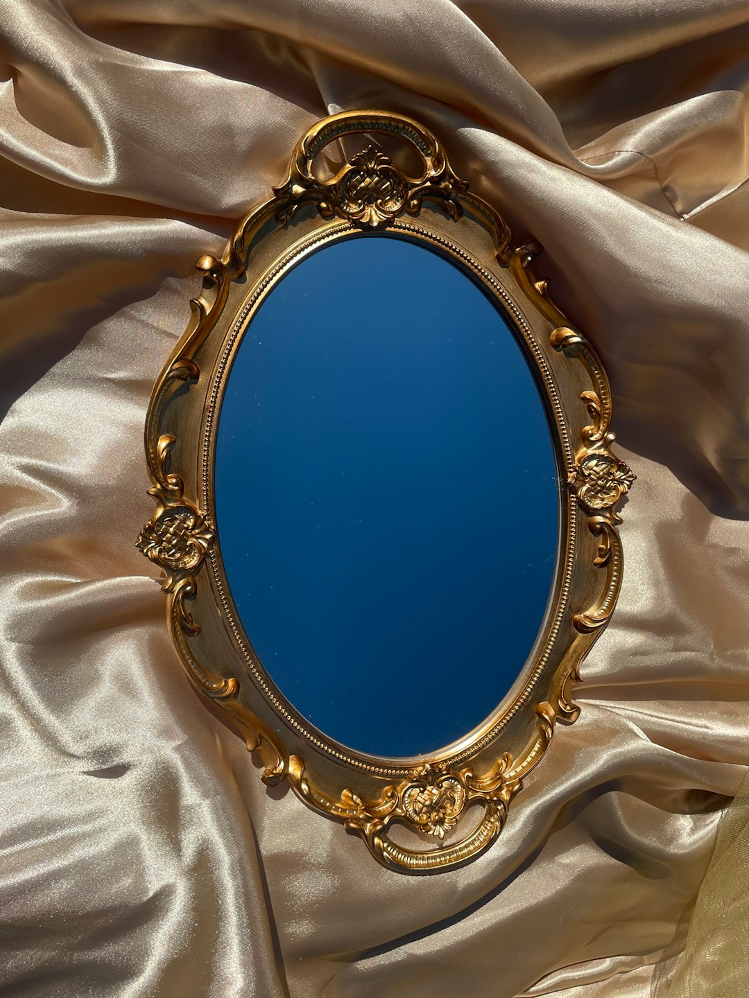 Heavy Ornate Mirrors: Weighed Down by the Past (image credits: unsplash)