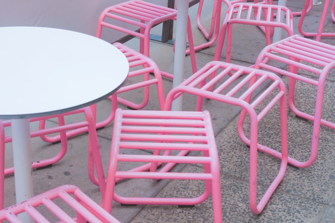 Brightly Colored Plastic Patio Furniture Fades Away (image credits: unsplash)