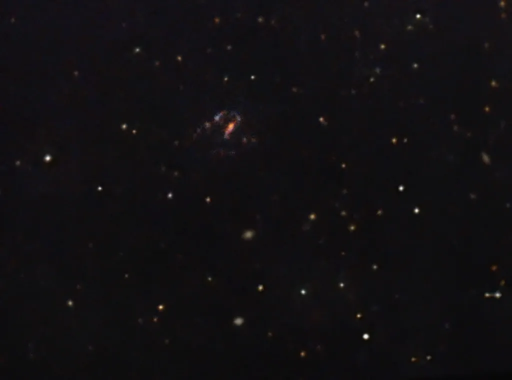Gravitational Lensing: When the Universe Plays Telescope (trout7000, Flickr, CC BY 2.0)