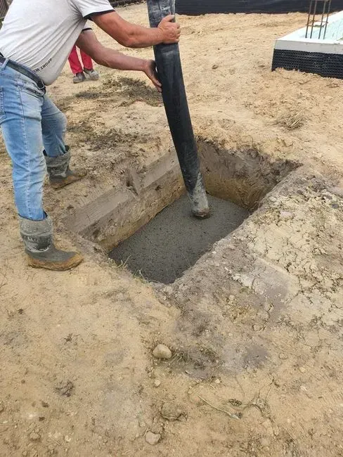 4. A continuous poured concrete or stone foundation (Image Credits: Pexels)