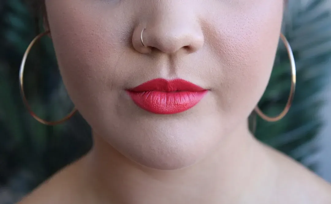 9. The Lip Press with Nostril Flare: Suppressed Strong Emotion (Image Credits: Unsplash)