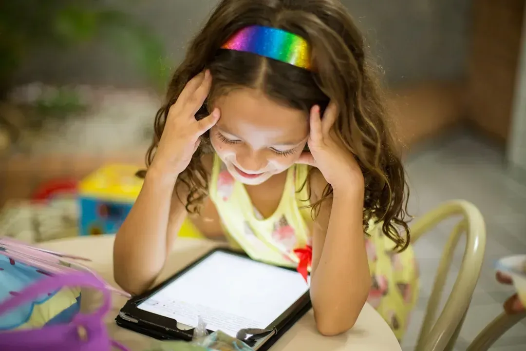 2. Handing over a phone the second a kid gets bored (Image Credits: Unsplash)