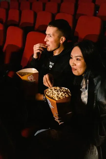 7. Watch her favorite movie or show together (Image Credits: Pexels)