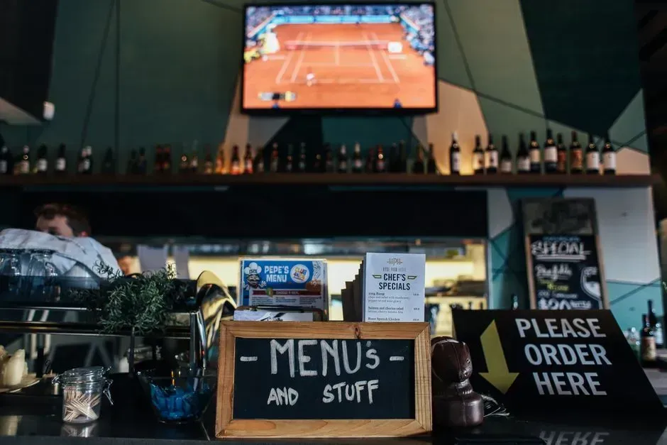 1. Flipping the menu over before even opening it (Image Credits: Pexels)