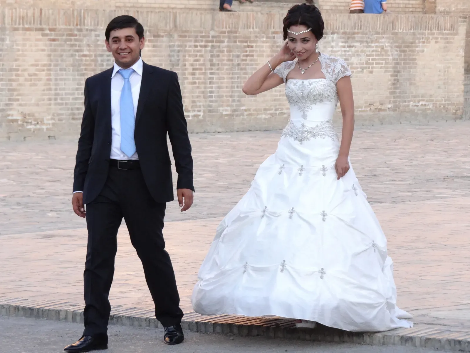 8. Get Married by Your Late Twenties, or Explain Yourself (Young Married Couple after Wedding - Old City - Bukhara - Uzbekistan, <a href="https://commons.wikimedia.org/w/index.php?curid=64146044" target="_blank" rel="noopener">CC BY-SA 2.0</a>)