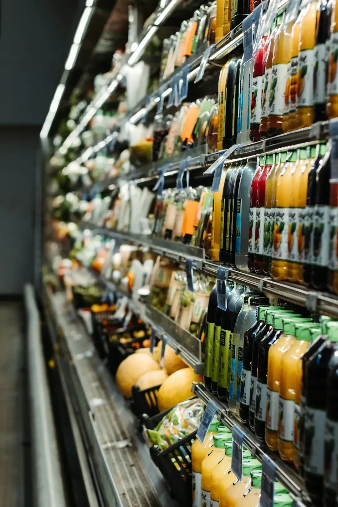 2. Staples Are Hidden at the Back of the Store (Image Credits: Unsplash)