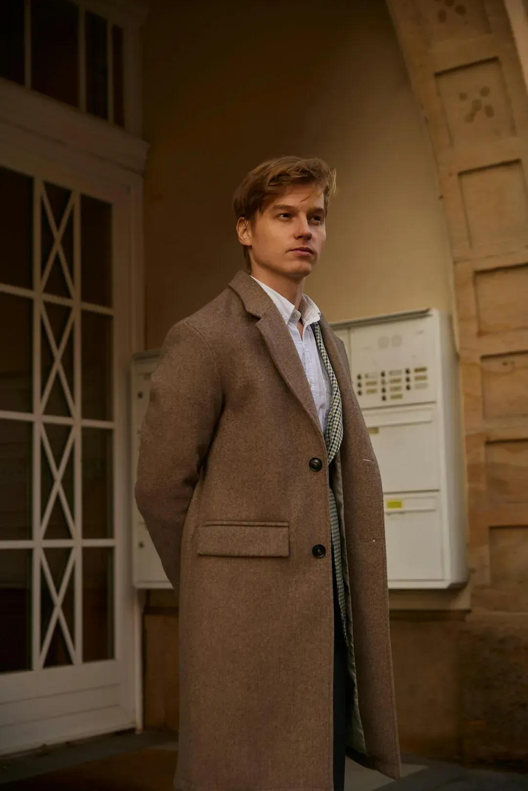 4. Well-tailored, understated outerwear (Image Credits: Unsplash)