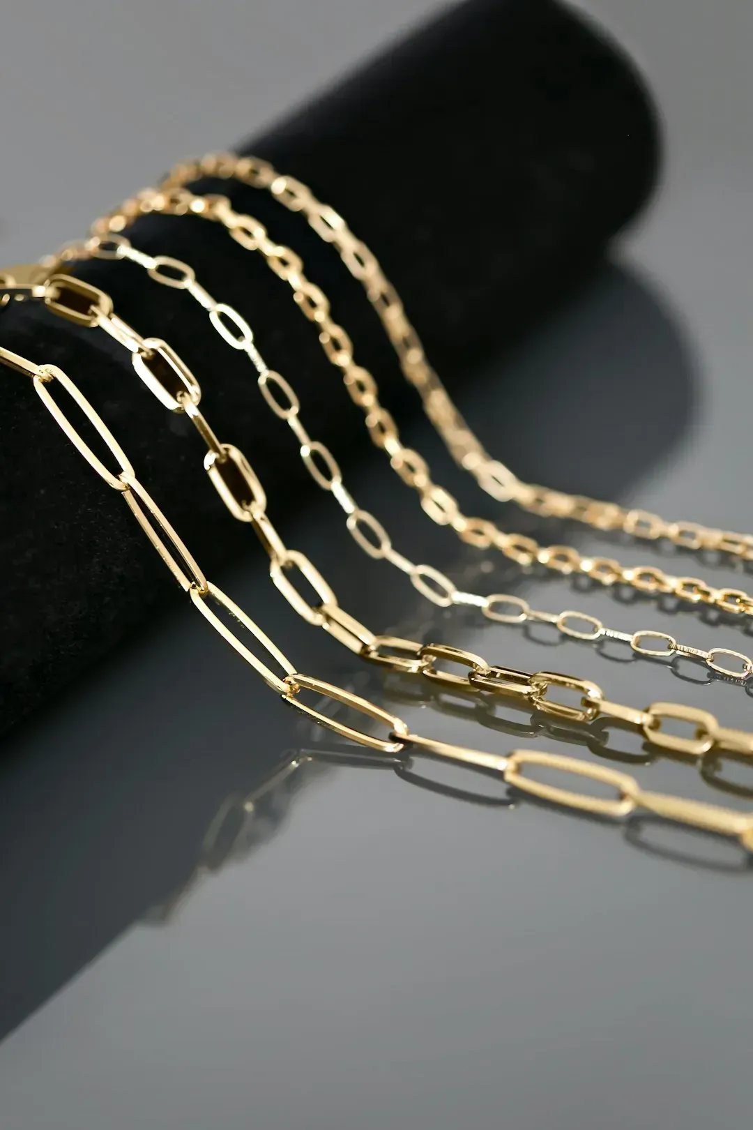 2. Excessive layers of gold chains (Image Credits: Unsplash)