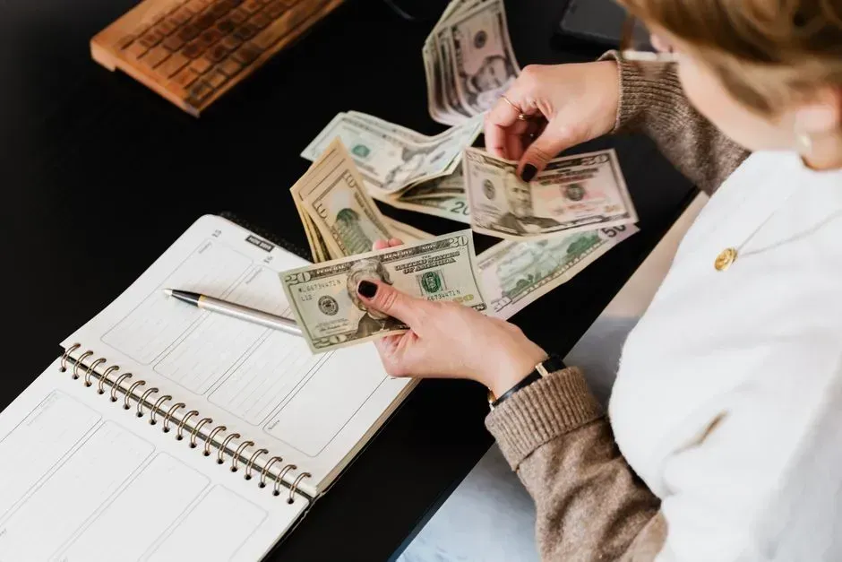 6. Paying for Nearly Everything in Cash or Check (Image Credits: Pexels)