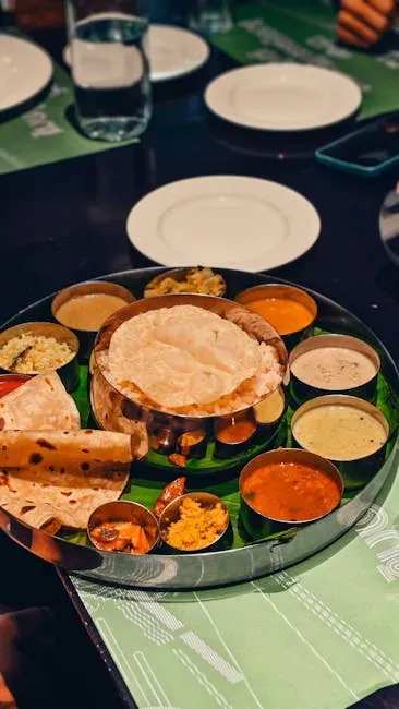 6. Indian Thali Service: The Philosophy of a Balanced Plate (Image Credits: Pexels)