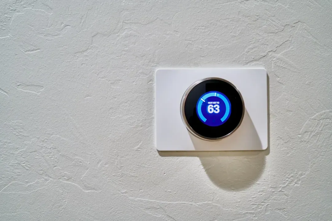 Installing a smart or programmable thermostat (Image Credits: Unsplash)