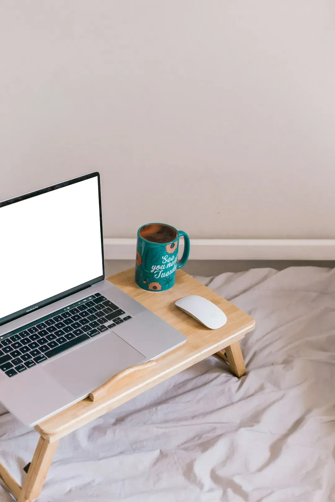 9. Working from the couch or bed instead of a defined workspace (Image Credits: Unsplash)