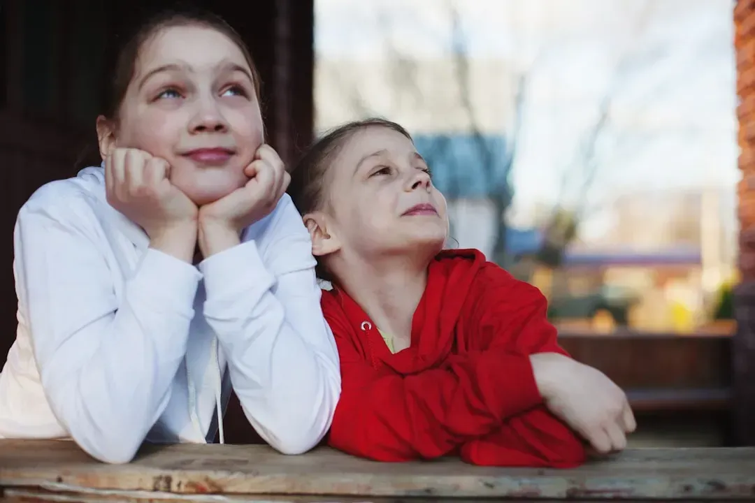 8. Having a "favorite" sibling dynamic (Image Credits: Unsplash)