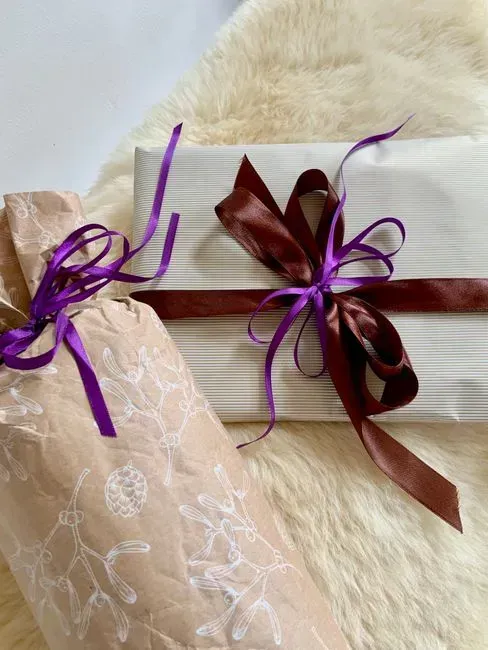 7. Reusing wrapping paper, ribbon, and gift bags (Image Credits: Pexels)