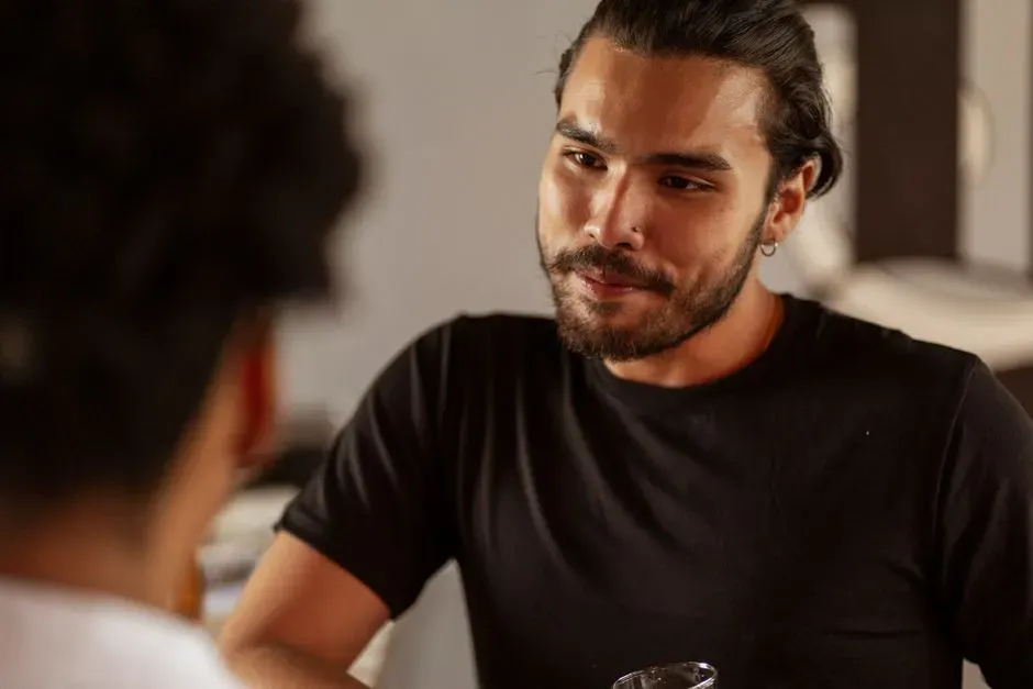 He Lowers His Voice When Talking to You (Image Credits: Pexels)