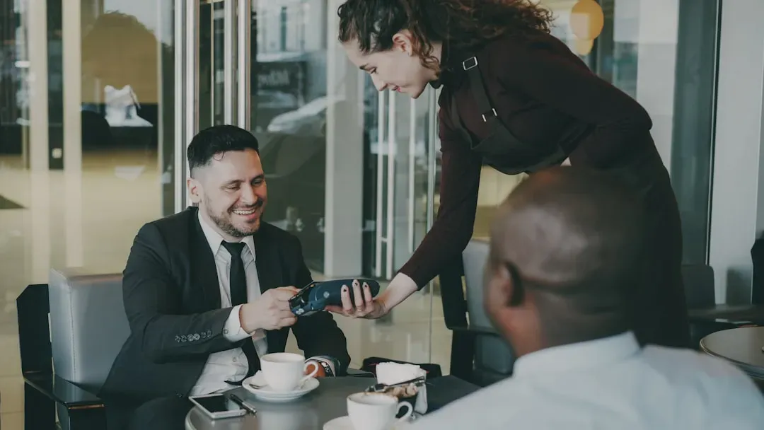 5. Not Accounting for Tax and Tip in Your Share (Image Credits: Unsplash)