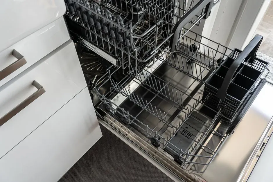 Cleaning the dishwasher filter and drain (Image Credits: Pexels)