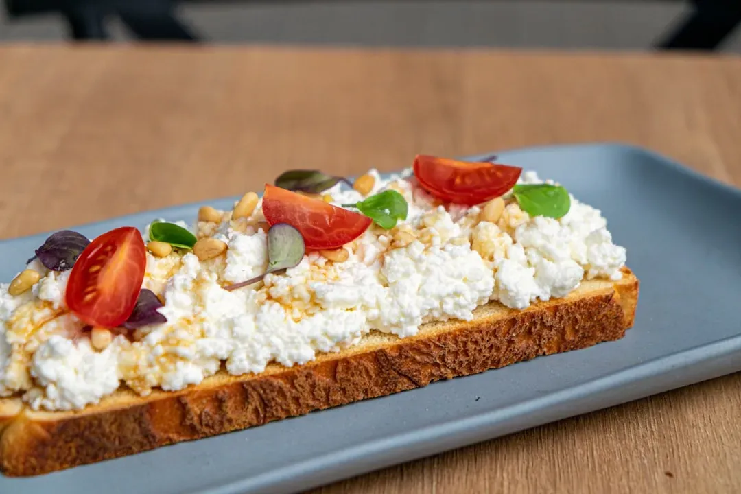10. Cottage cheese and vegetable toast platter (Image Credits: Unsplash)