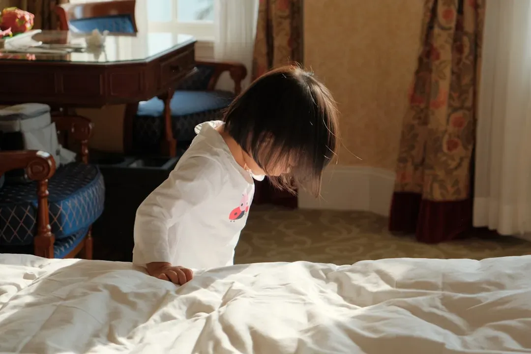 3. Making the Bed (Ages 6 to 8) (Image Credits: Unsplash)