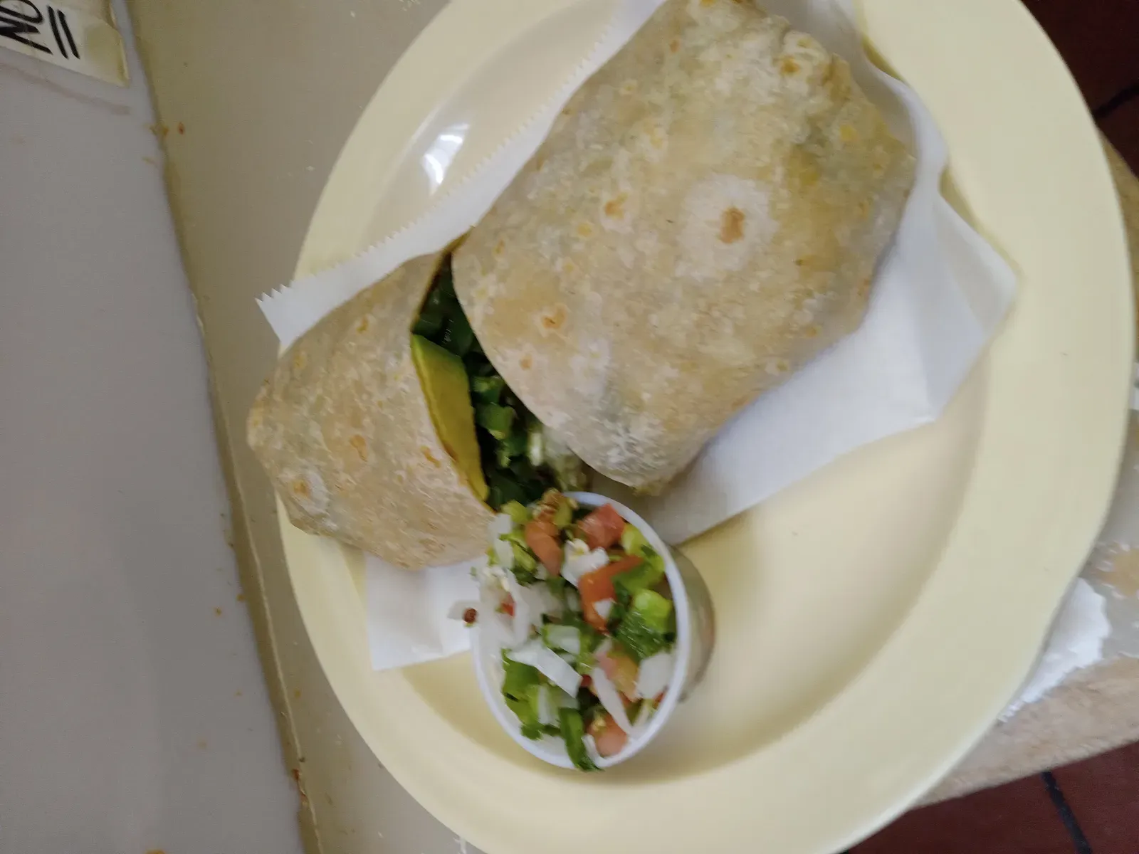 3. Taco Bell's Fiesta Veggie Burrito (By Gerardolagunes, <a href="https://commons.wikimedia.org/w/index.php?curid=189688745" target="_blank" rel="noopener">CC0</a>)