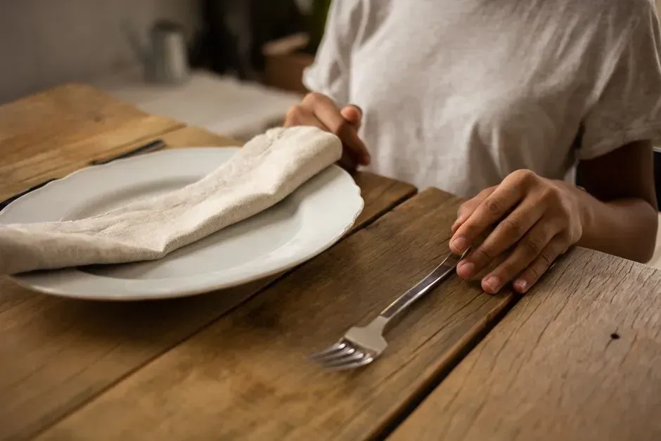 6. Teaching Table Manners and Eating Together (Image Credits: Pexels)