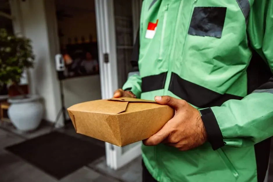 7. Frequent Restaurant Dining and Food Delivery (Image Credits: Pexels)