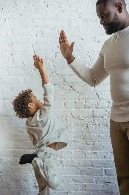 2. Constantly praising your child in front of others (Image Credits: Pexels)